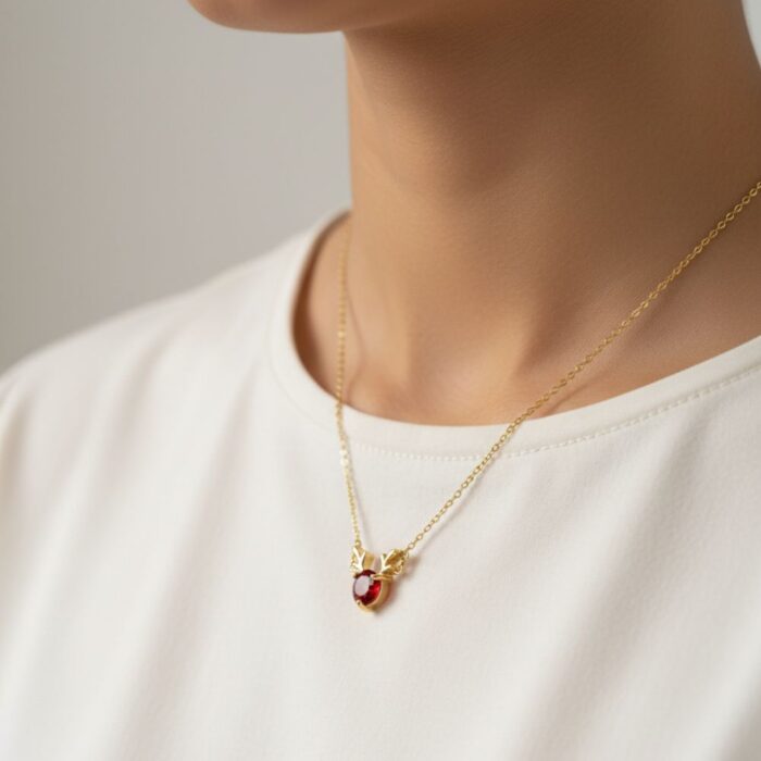Second model wearing the Reindeer Antler necklace indoors, styled with a casual outfit.